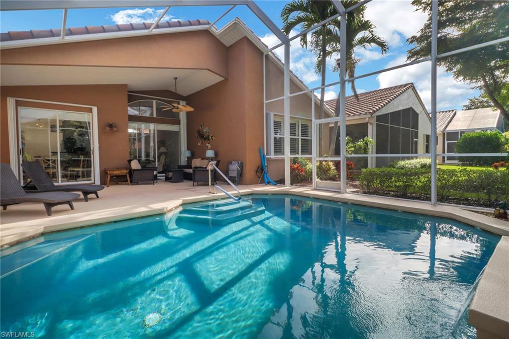 9146 Springview Loop Estero, FL 33928 - Photo 26 of 49 a view of a house with pool table and chairs