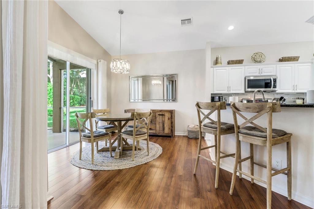 9146 Springview Loop Estero, FL 33928 - Photo 5 of 49 a view of a dining room with furniture window and outside view