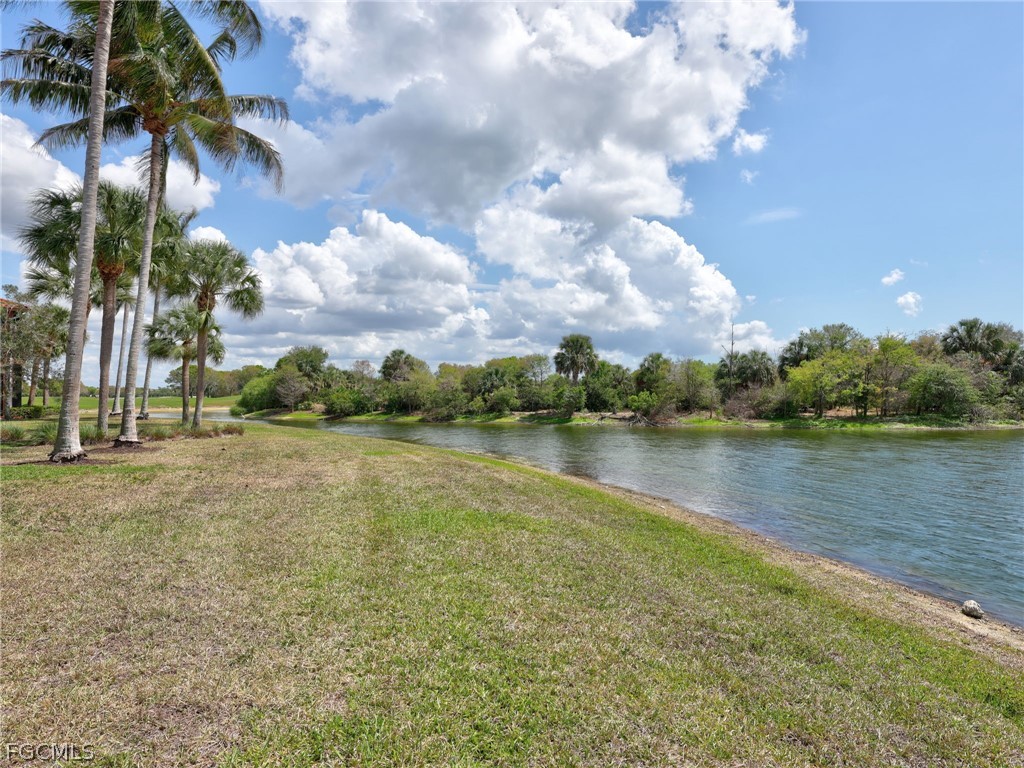 6422 Legacy Circle, Unit 704 Naples, FL 34113 - Photo 41 of 49 a view of a lake