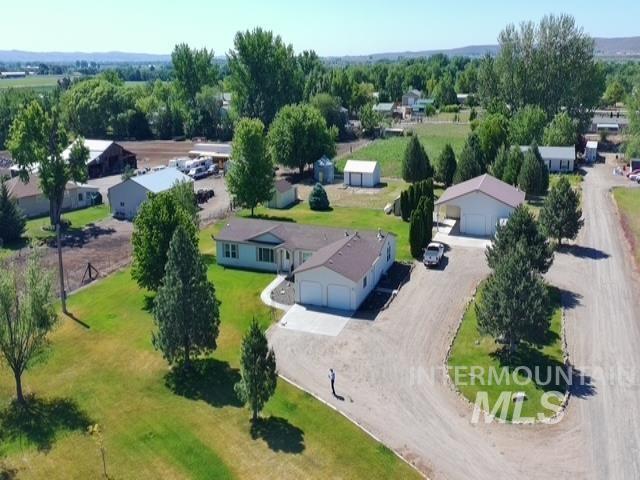1095 County Road 70 Weiser, ID 83672 - Photo 5 of 44 Expansive property featuring a residence, detached garage, and multiple outbuildings