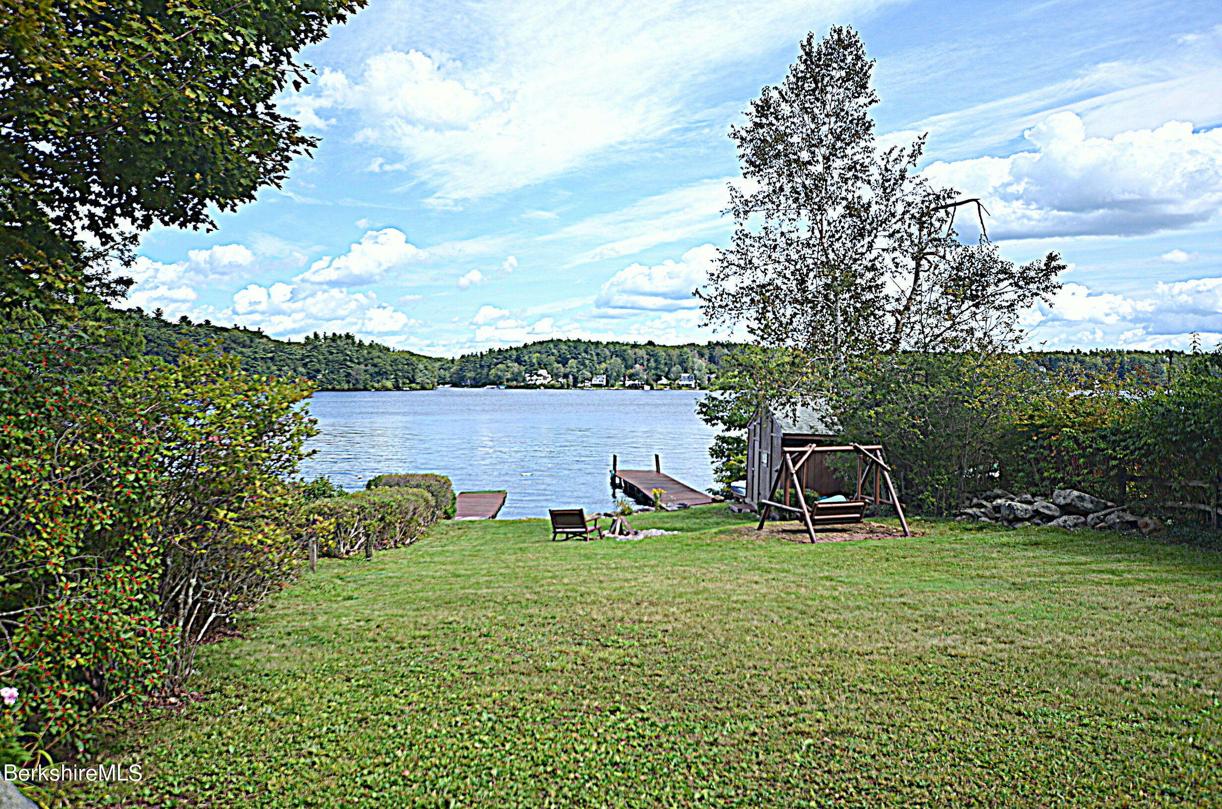 71 Flint Farm Road Otis, MA 01029 - Photo 3 of 21 a view of a lake with houses