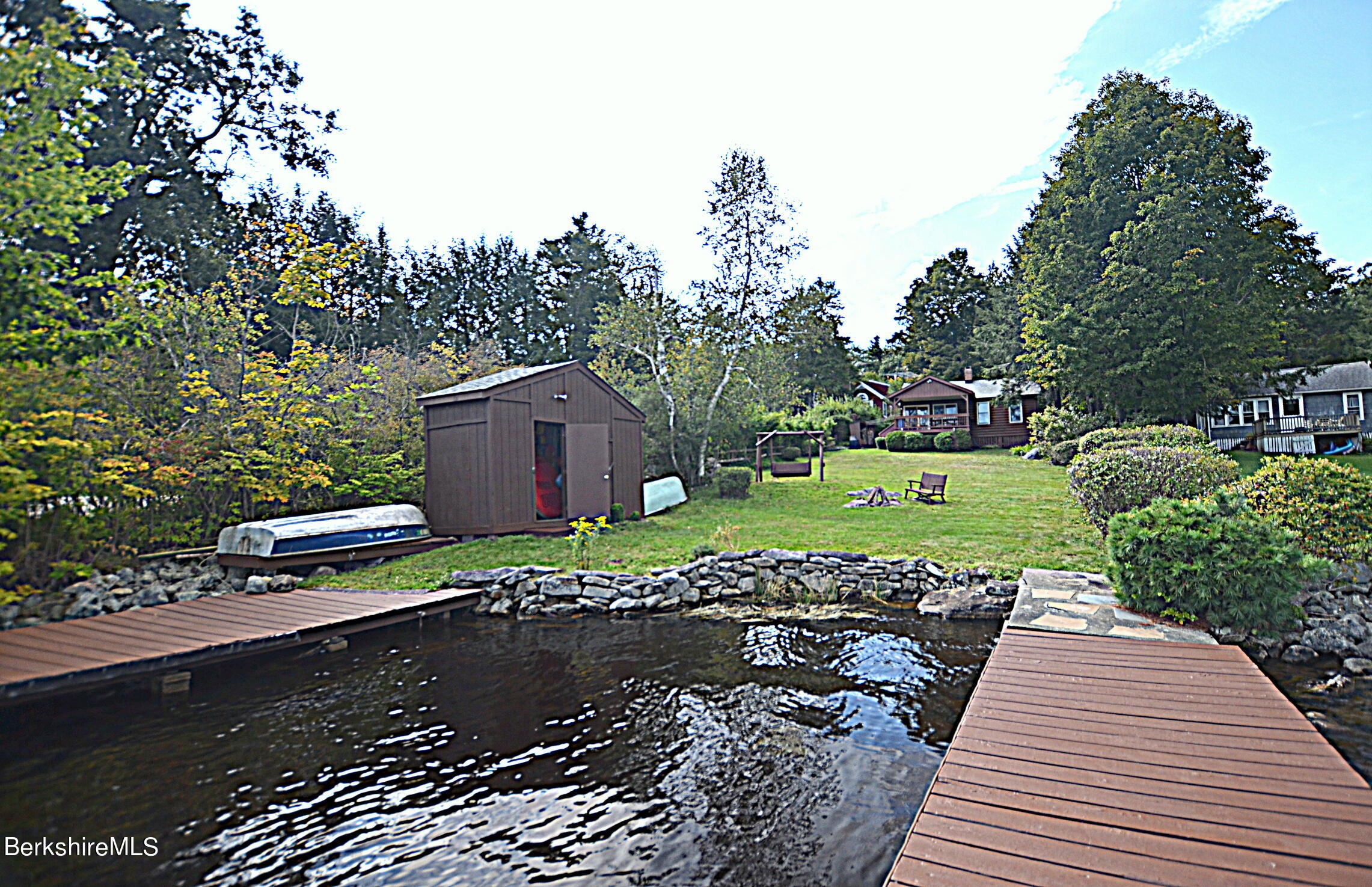 71 Flint Farm Road Otis, MA 01029 - Photo 6 of 21 a view of a backyard with sitting area