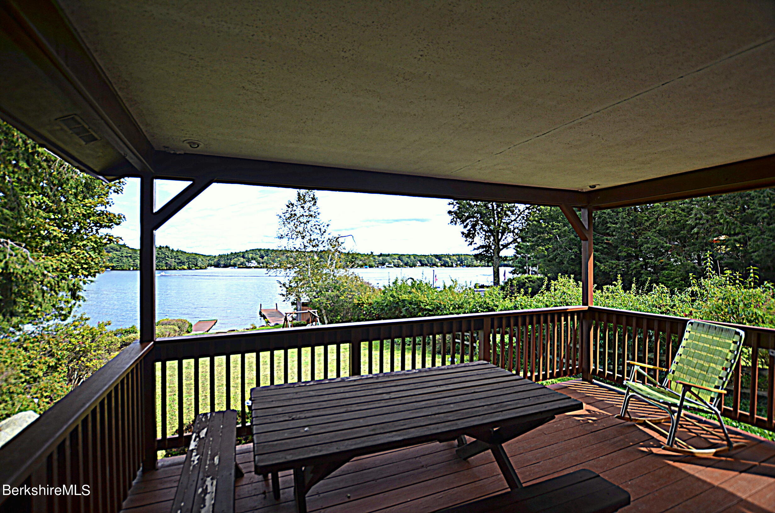71 Flint Farm Road Otis, MA 01029 - Photo 10 of 21 a view of a two chairs in the balcony