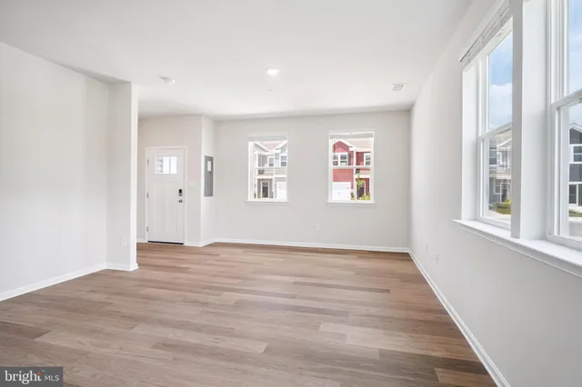 a view of kitchen with wooden floor