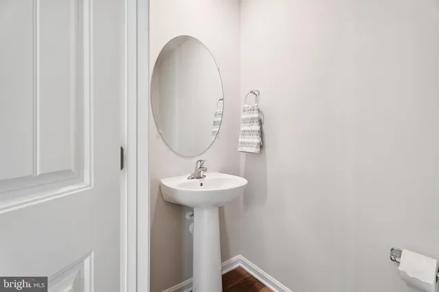 a view of a bathroom with a glass shower door