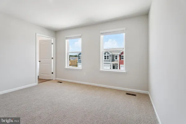 a bathroom with a sink and a window