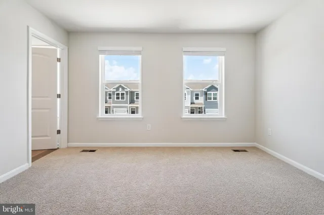 a bathroom with a sink and a window