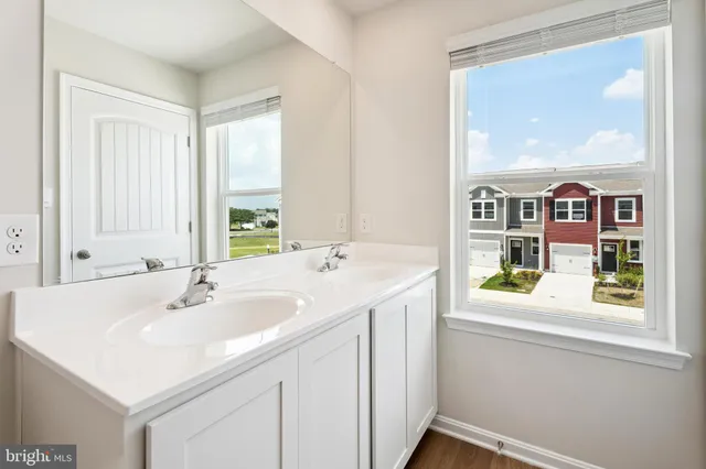 a picture of a bench in the window