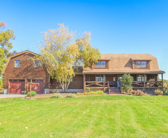 a view of a house with a swimming pool