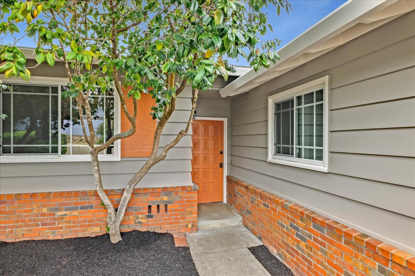 2560 St Cloud Drive San Bruno, CA 94066 - Photo 2 of 7 a backyard of a house with seating space