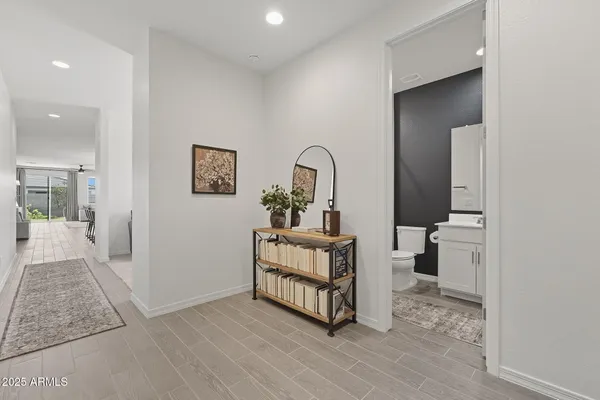 a view of a bedroom from a hallway