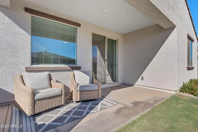 a view of a house with yard and a garage