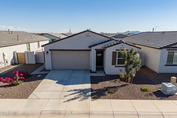 an aerial view of residential building and ocean