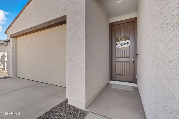 an aerial view of a building with parking space