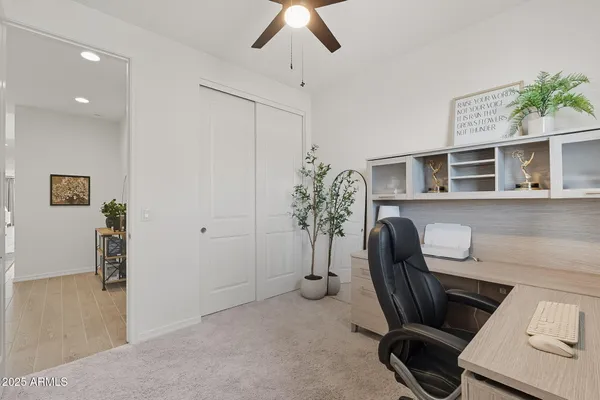 a view of a workspace with furniture