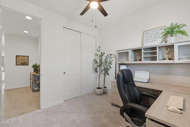 a view of a workspace with furniture