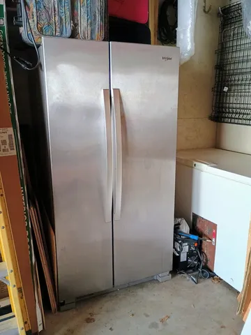 a house view with a backyard space