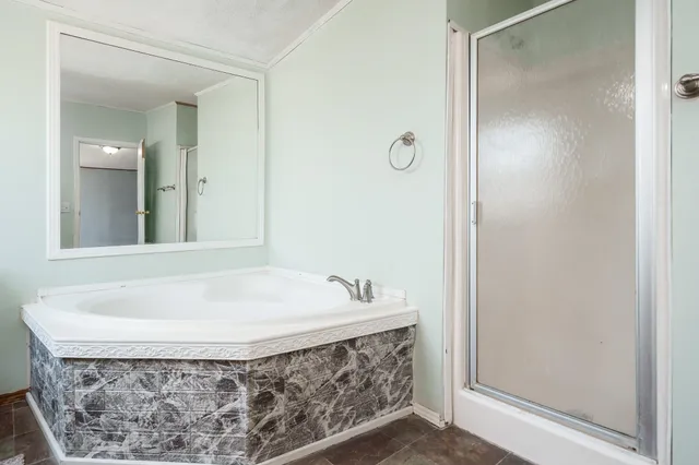 a bathroom with a bathtub and a sink