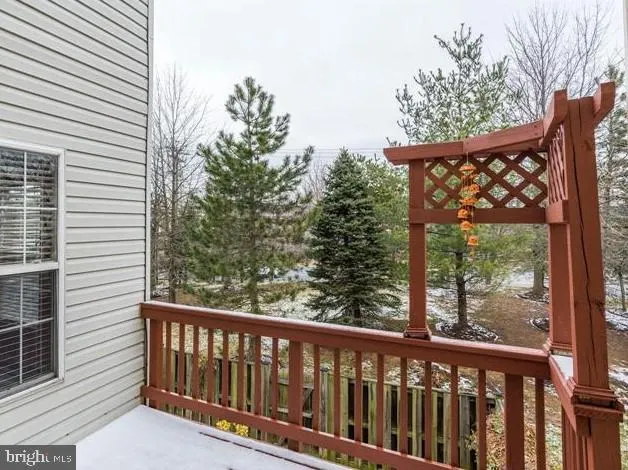 a view of a wooden roof deck