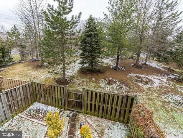 a view of a wooden fence