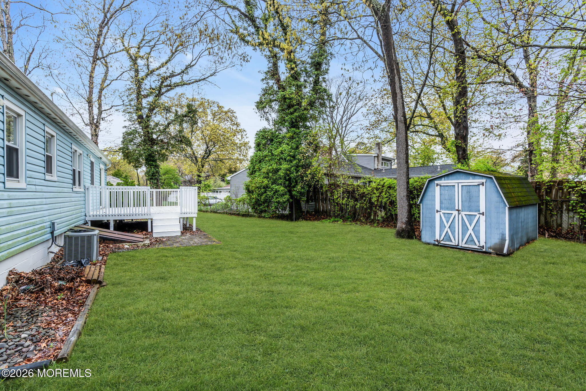 593 Beach Plum Road Brick, NJ 08723 - Photo 34 of 38 a view of a house with backyard and a tree