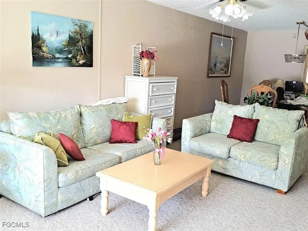 a living room with furniture and a couch