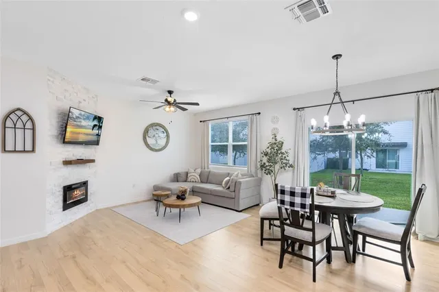 a living room with furniture and a table