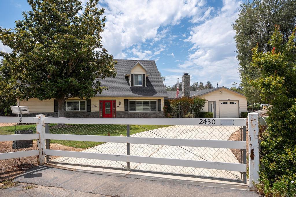 2430 Geyer Lane Alpine, CA 91901 - Photo 51 of 60 a front view of a house with a yard