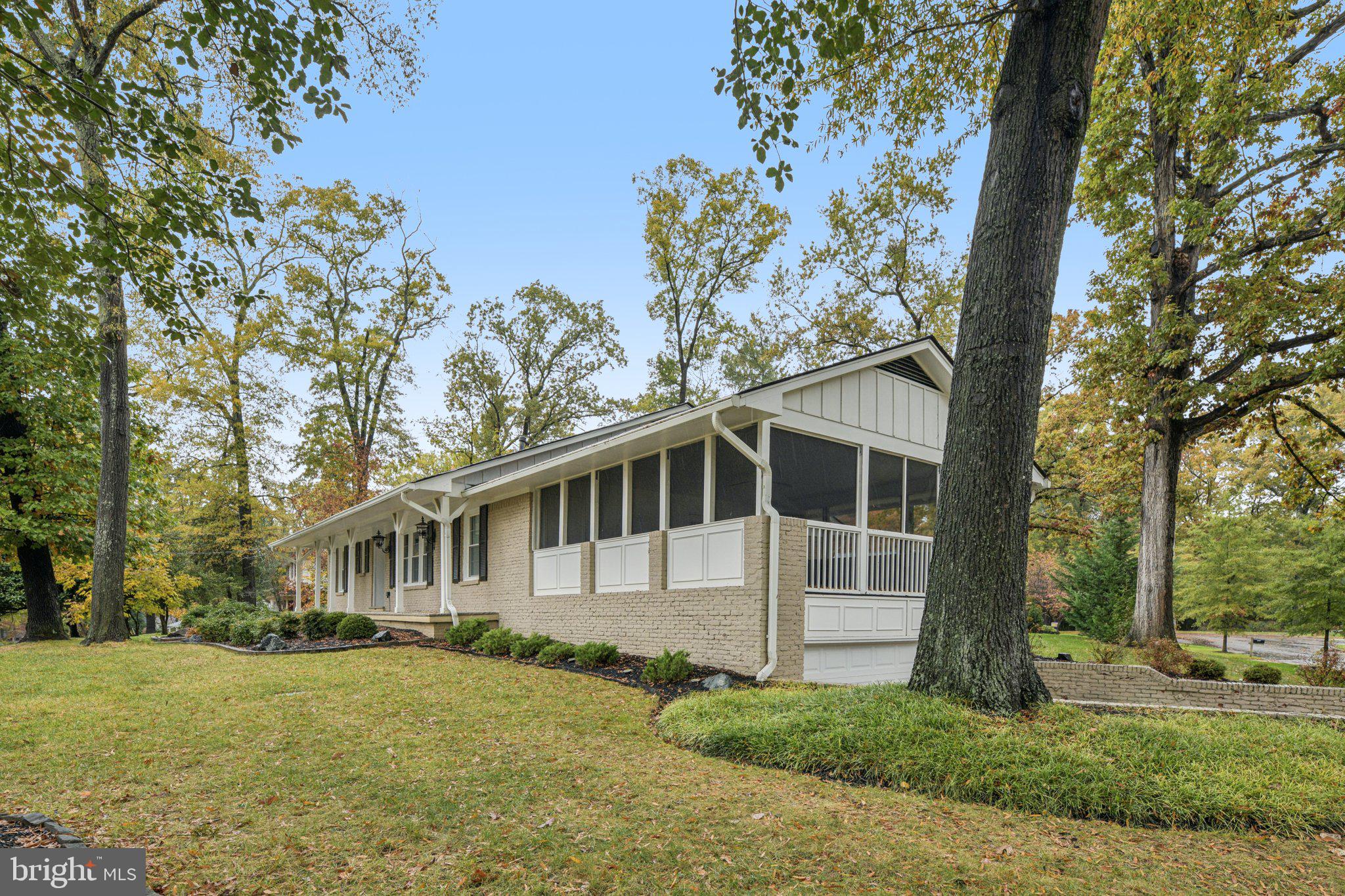 12301 Arrow Park Drive Fort Washington, MD 20744 - Photo 3 of 10 a front view of a house with garden