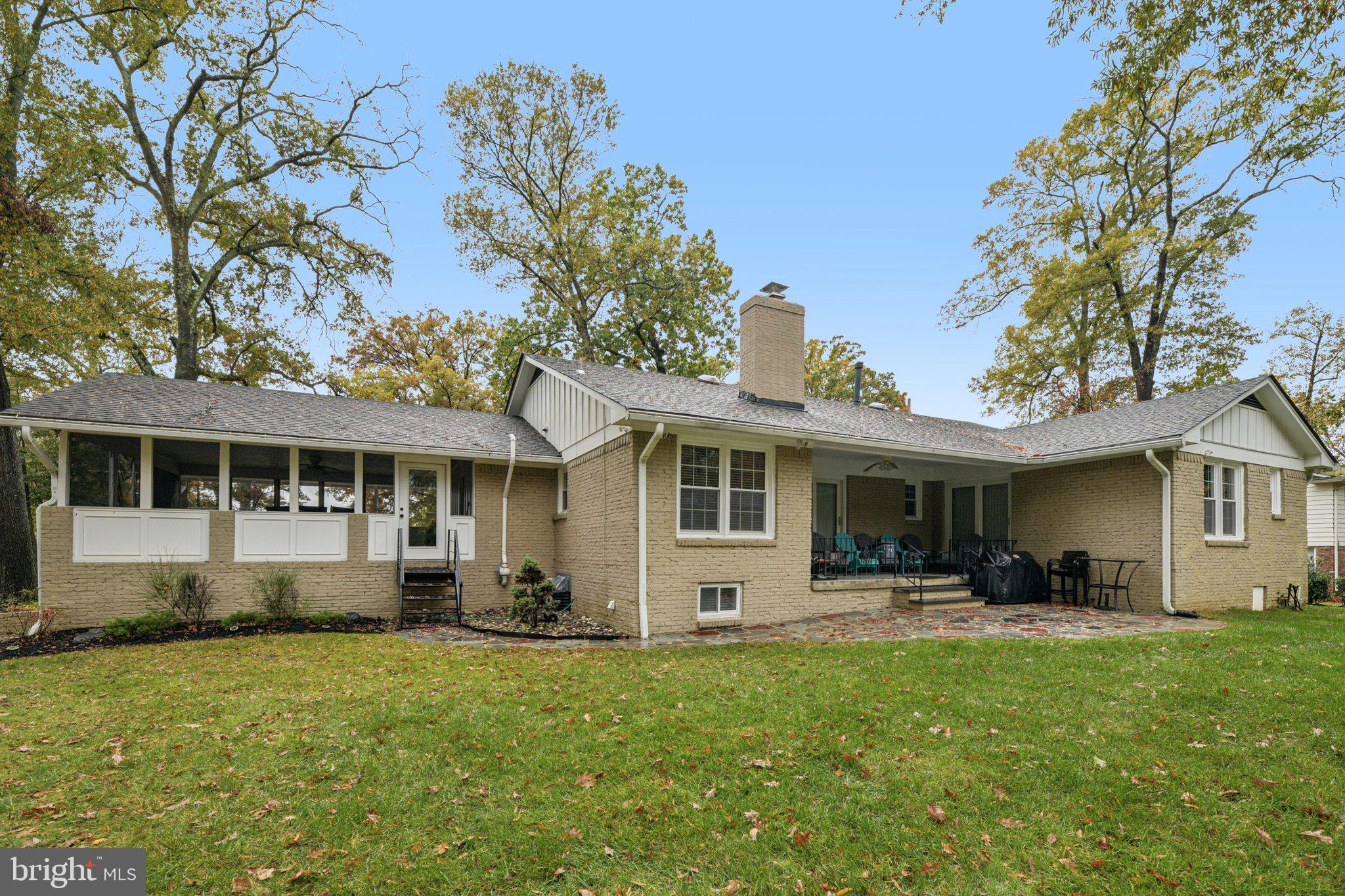 12301 Arrow Park Drive Fort Washington, MD 20744 - Photo 9 of 10 a front view of house with yard and outdoor seating