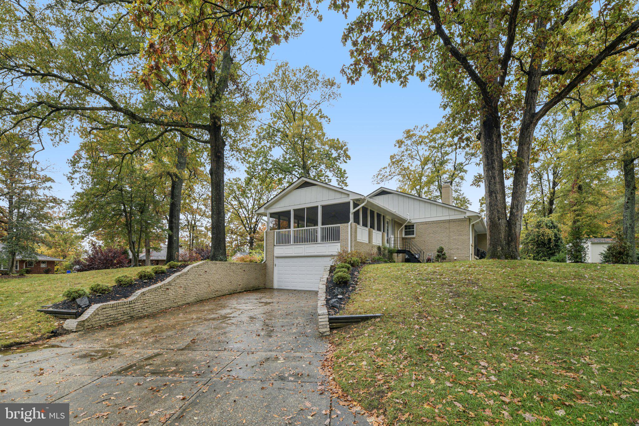 12301 Arrow Park Drive Fort Washington, MD 20744 - Photo 10 of 10 a house with trees in the background