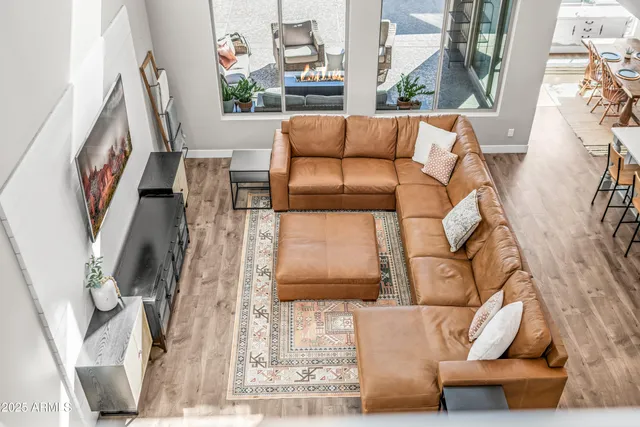 an empty room with a mirror and a sink