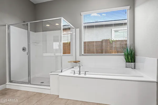 a living room with furniture and a night stand