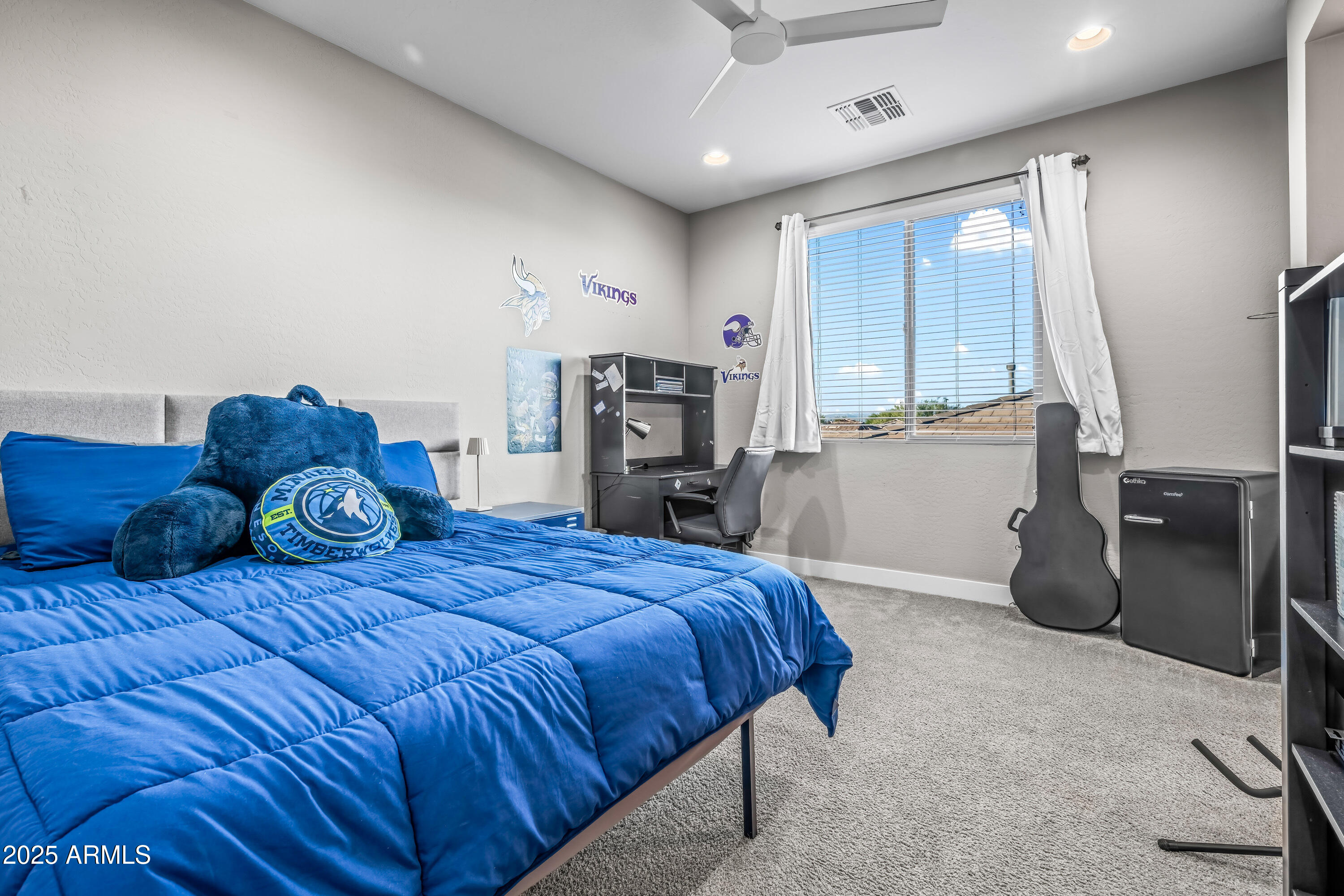 22211 North 31st Street Phoenix, AZ 85050 - Photo 35 of 94 a bedroom with a bed and a large window