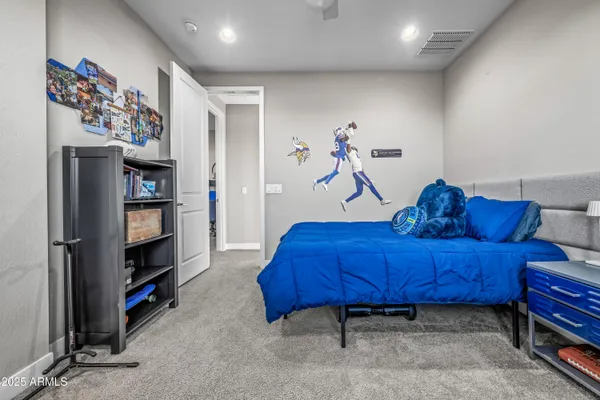 a kitchen with stainless steel appliances a refrigerator sink and microwave