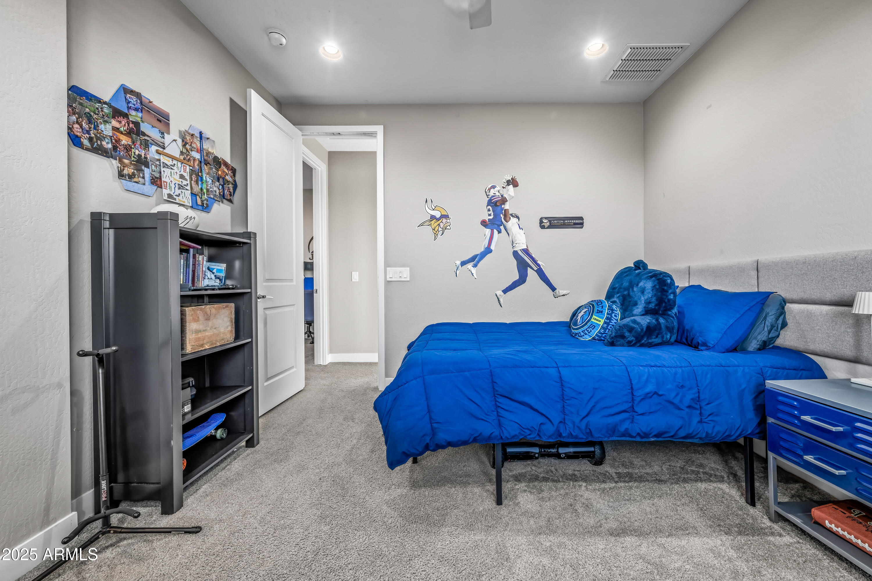22211 North 31st Street Phoenix, AZ 85050 - Photo 36 of 94 a living room with furniture and a flat screen tv