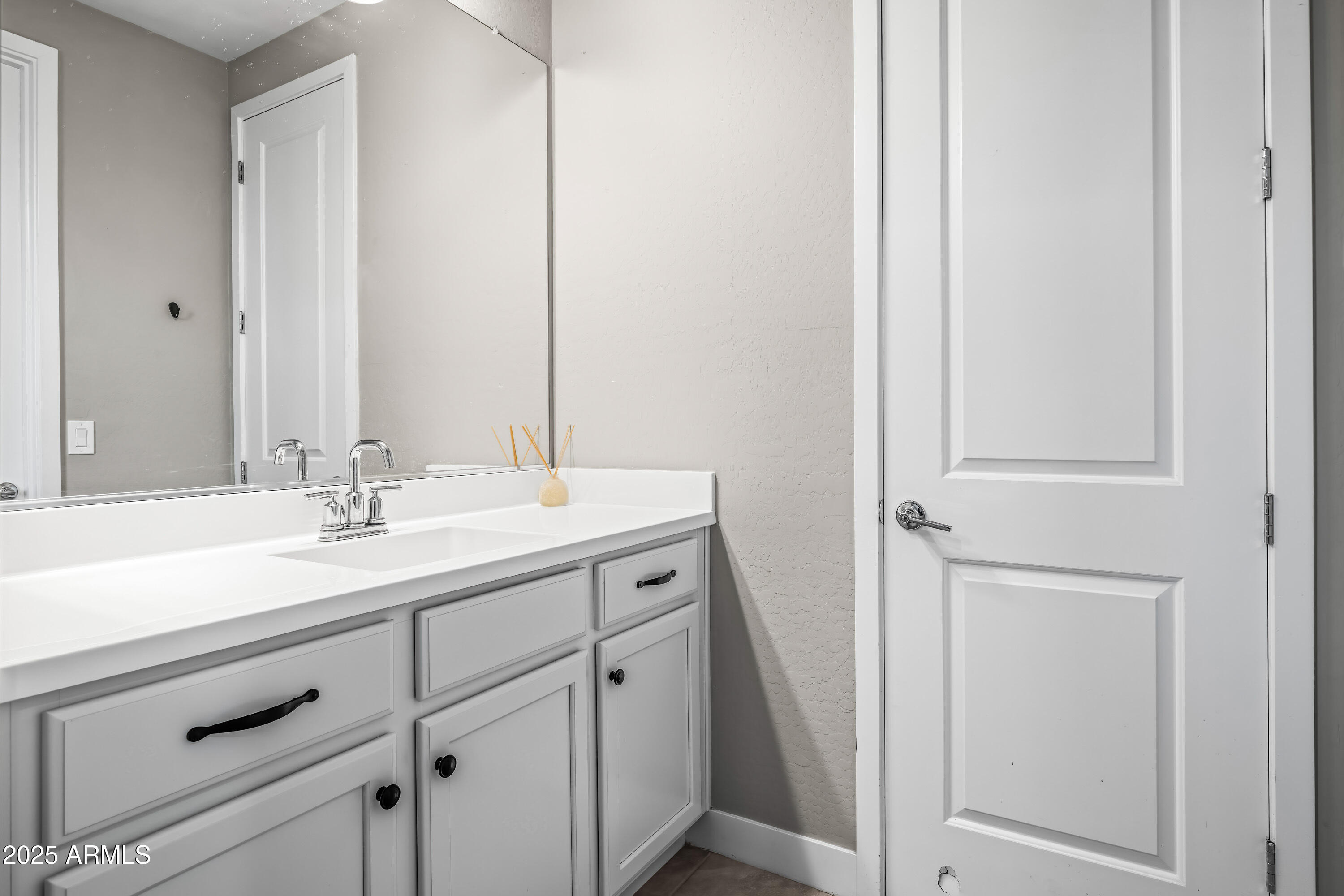 22211 North 31st Street Phoenix, AZ 85050 - Photo 37 of 94 a bathroom with a sink and a mirror