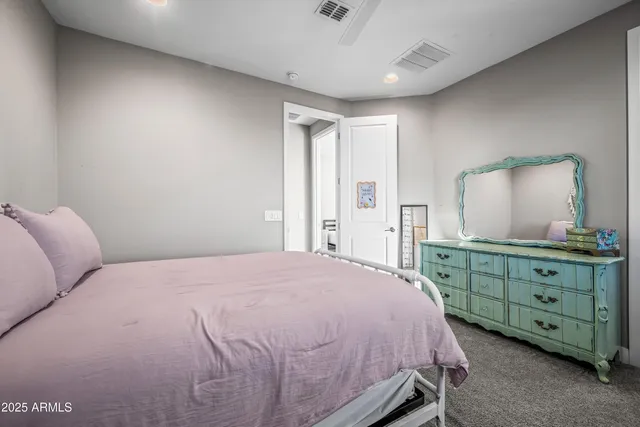 an aerial view of residential houses with a city