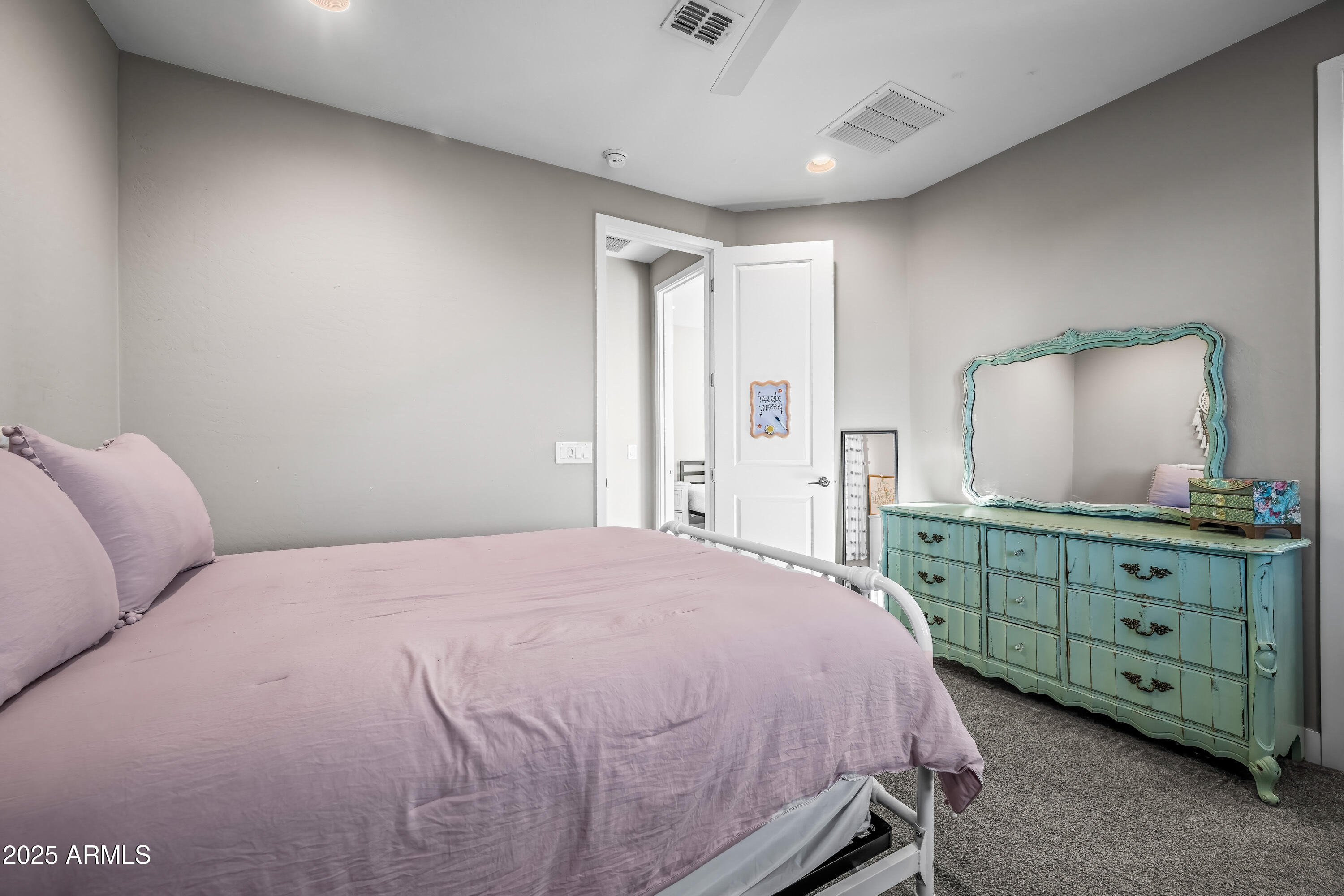 22211 North 31st Street Phoenix, AZ 85050 - Photo 41 of 94 a bedroom with a bed and a dresser