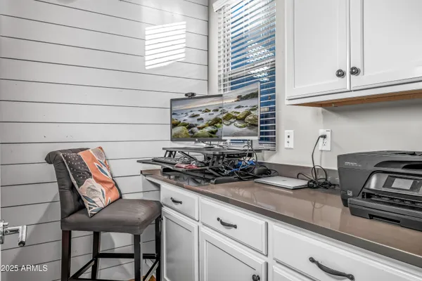 a outdoor living space with couch and a fire pit