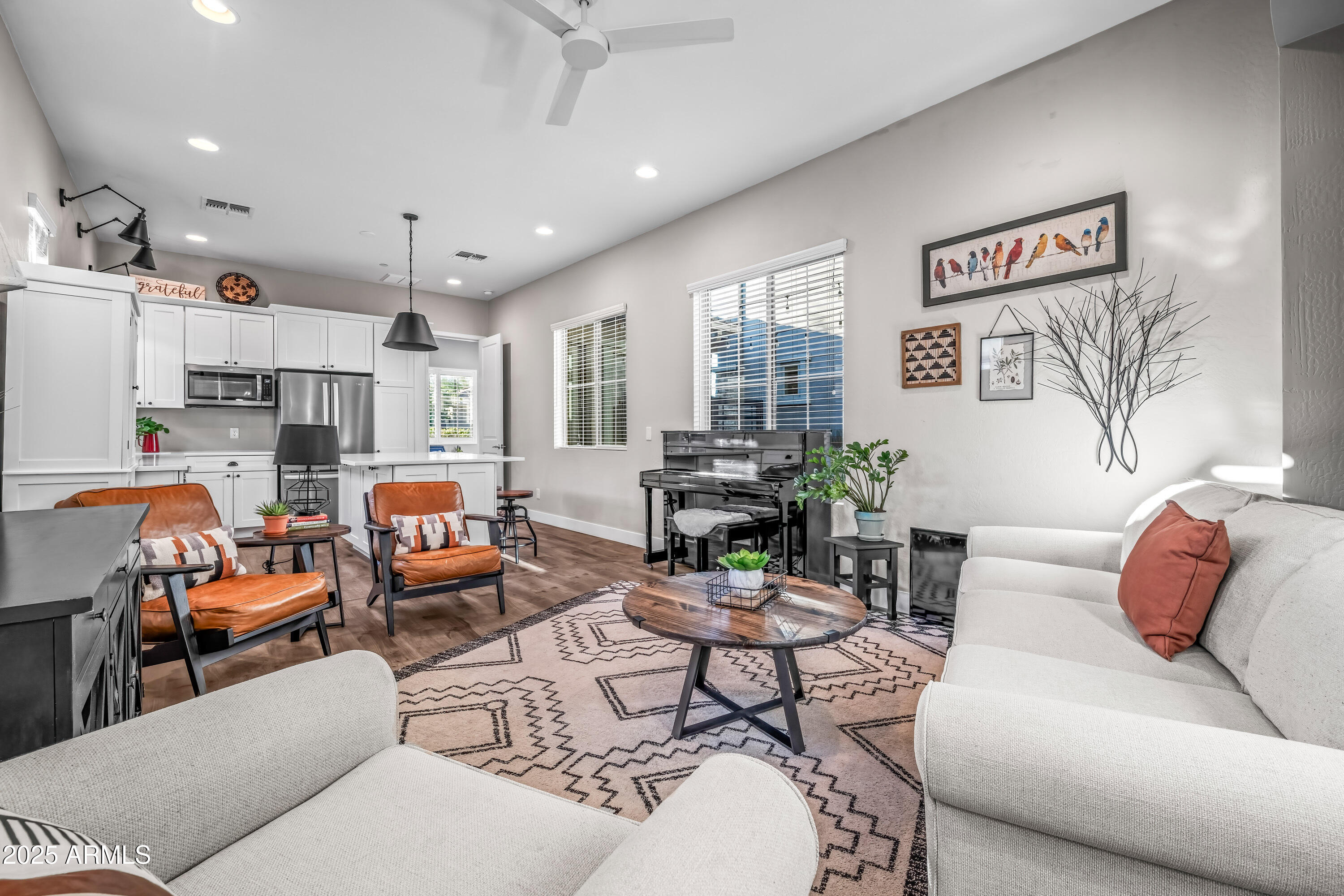 22211 North 31st Street Phoenix, AZ 85050 - Photo 46 of 94 a living room with furniture kitchen view and a large window