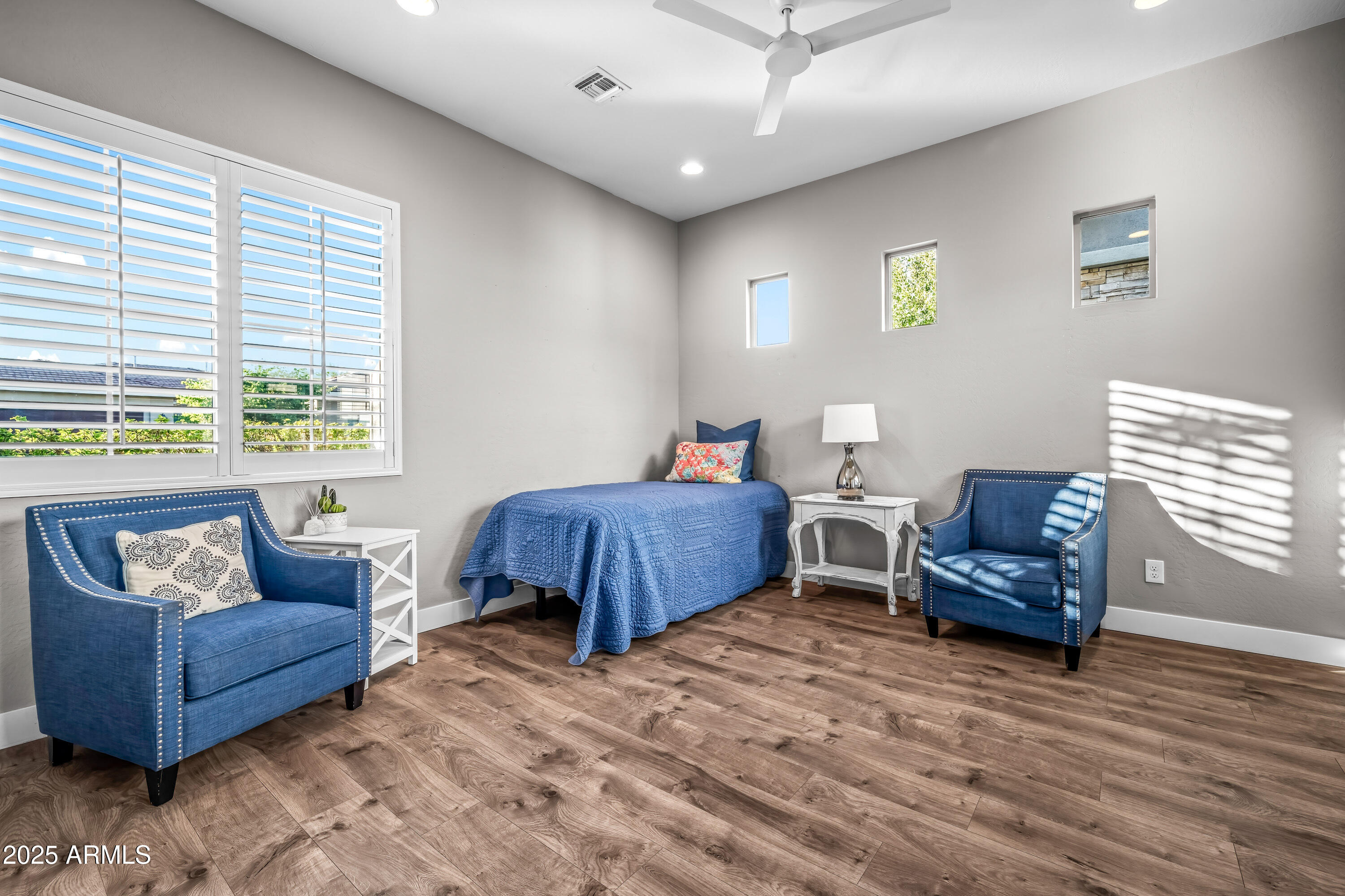22211 North 31st Street Phoenix, AZ 85050 - Photo 50 of 94 a bedroom with furniture and a window