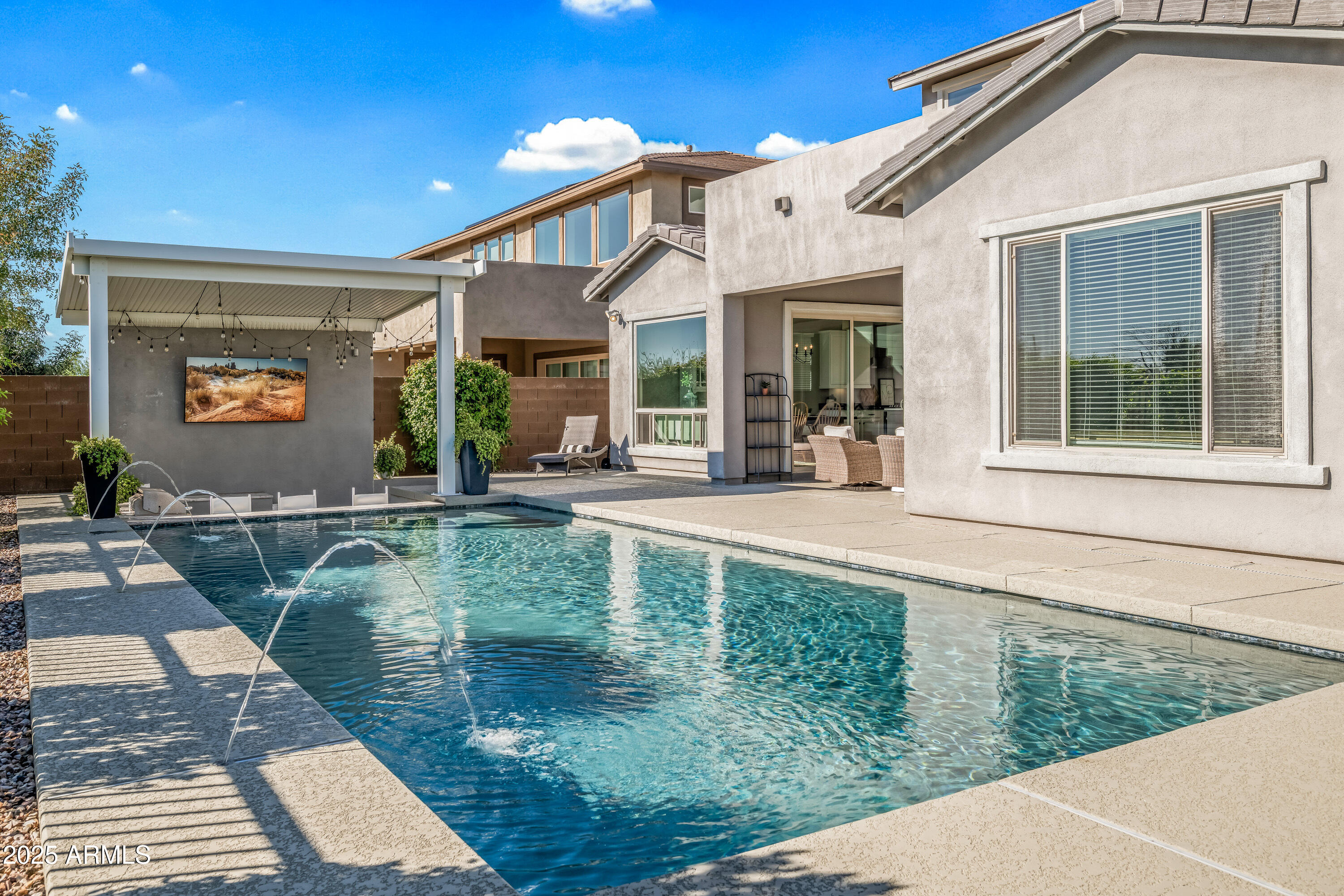 22211 North 31st Street Phoenix, AZ 85050 - Photo 69 of 94 a view of a house with a patio