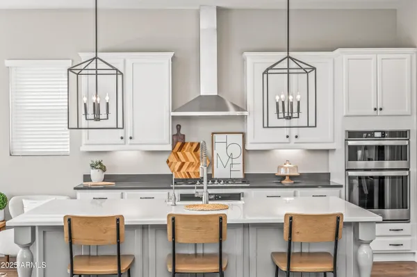 a view of a chairs and table in the patio
