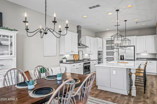 a living room with furniture a rug and wall