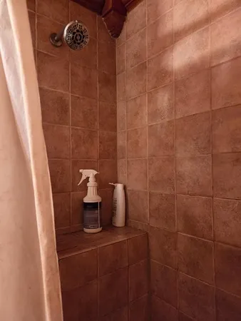 a bedroom with a bed and cabinets