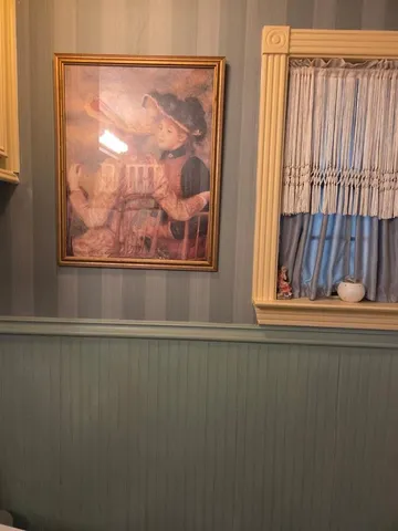 a room with lots of different colored cloths