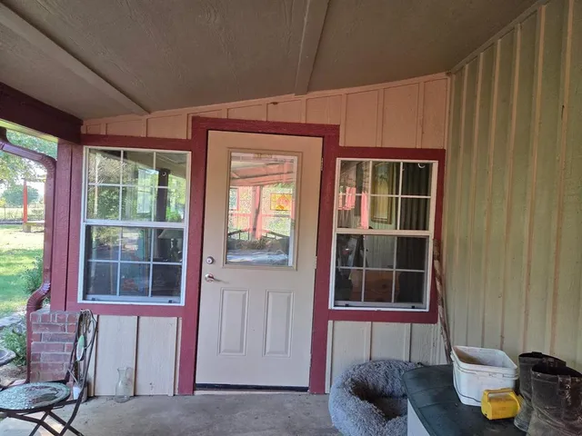 a view of a park with large trees