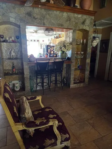 a room with furniture and a window