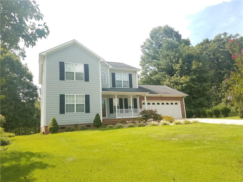200 Jacksons Run Morganton, NC 28655 - Photo 1 of 7 a front view of a house with a yard